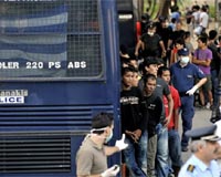 Greek police destroy Afghan migrant camp