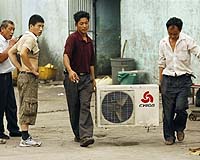 Hu Dons Shirtsleeves, But Energy Demand Surges