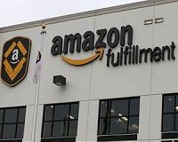 Speedy delivery hits Amazon's bottom line; shares slump
