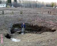 Degrading permafrost puts Arctic infrastructure at risk by mid-century