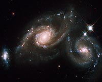 Hubble Celebrates IYA2009 With Galaxy Triplet Arp 274