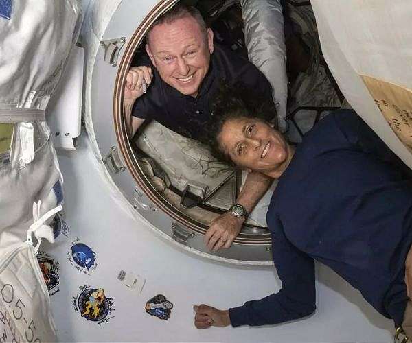 Two astronauts stranded on space station to touch down early