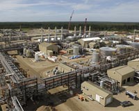 Oil firms in fire-hit Canada region back to work in coming days at best: premier