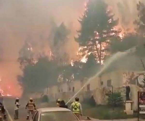Chileans who survived deadly forest fire fear flames will return