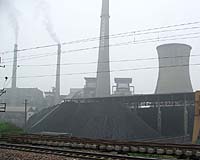 Scientists call for curbing coal burning