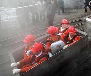 70 trapped, eight killed in China coal mines: reports
