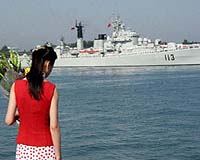 China to begin projecting military around the world: analysts