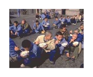 Exiled Chinese author recounts prison 'hell'