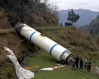 Parachutes guide China's rocket debris safely to earth