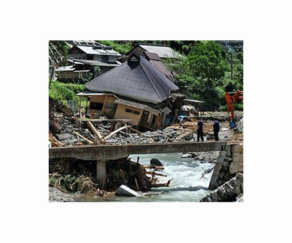 Rescuers comb muddy riverbanks after Japan floods kill seven