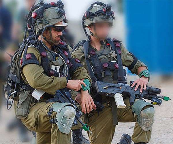 On the edge of Gaza, Israeli soldiers brace for battle