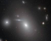 The sleeping giant at NGC 4889
