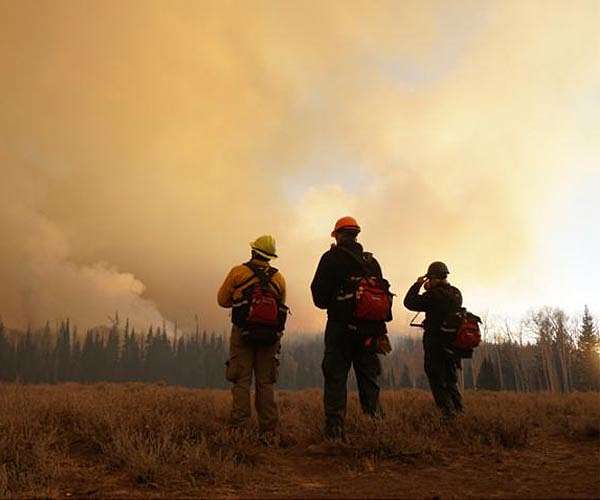 California fire departments share staff as blazes rage