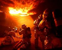 Firefighter killed in massive California blaze