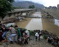 Shikaras to the rescue on Kashmir's flooded paradise