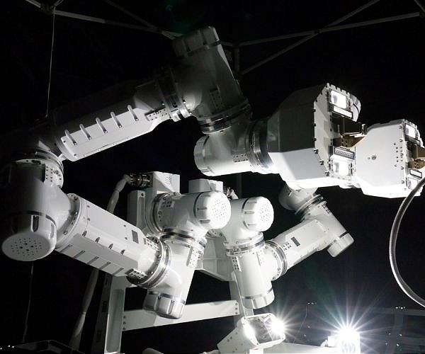 Crew Explores Space Construction Techniques and Lunar Cement Mixing