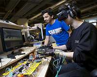 A glove powered by soft robotics to interact with virtual reality environments