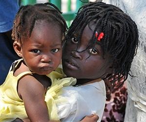 With 300,000 Dead Haiti Lures Back Students With Free Meal
