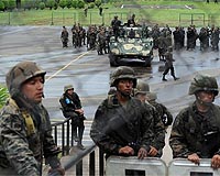 Honduran military repositions as Zelaya seeks sanctions
