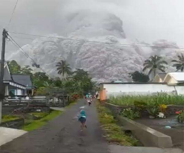 Indonesia volcano erupts again, hampering rescue operations