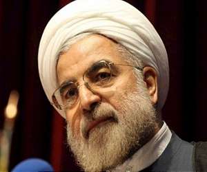 Shoe thrown as Rouhani home after historic Obama call