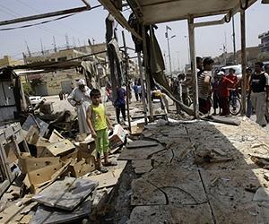 Iraq twin bombings kill 7 in first test for Maliki