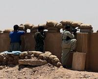 Syrian Kurds battle IS as US steps up air war