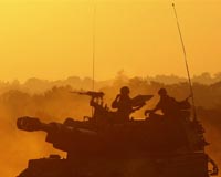 Israeli troops to remain in Gaza for now: army