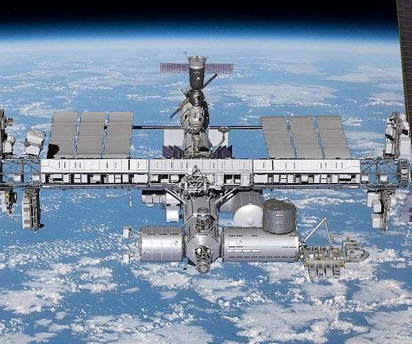 Astronauts unfurl 60-foot-long space station solar array