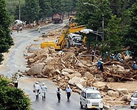 Death toll rises to 10 in Japan landslides, floods