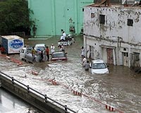 Saudi floods kill 77, leave scores missing