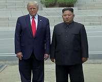 Trump returns to critics after historic N.Korea stop