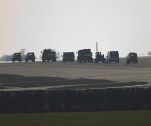 NATO warns civilians to avoid pro-Kadhafi forces in Libya