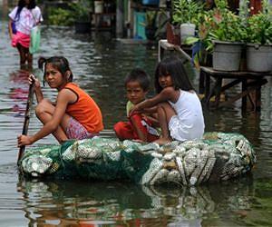 Aid rushed to Philippine flood victims