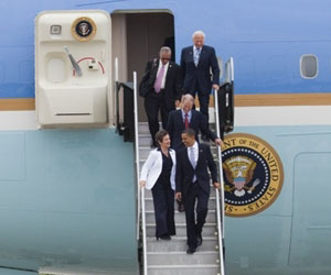 Obama races back to White House as hurricane threatens