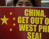Philippines warns China flouting UN maritime laws