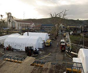 New storm wrecks Philippines typhoon victims' shelters