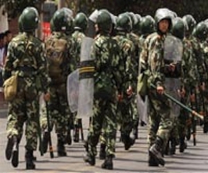 Police in China fire tear-gas, beat protesters: witnesses