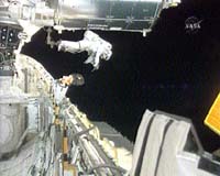 Astronauts install coolant tank at space station