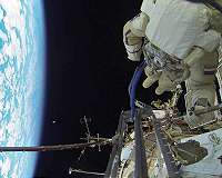 Viable Spores, DNA Fragments Discovery at ISS Justifies Biosphere's Expansion