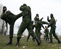 Russia ends war games as precaution against COVID-19