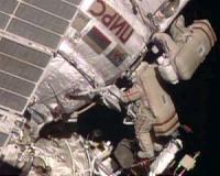 Russians spacewalk to retrieve biological samples