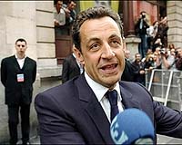 Sarkozy praises 'frank' talks with Putin, 'closer' views on Iran