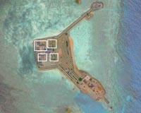 China boosts defenses on S.China Sea islets: US experts