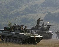 Georgia says Russia massing troops in South Ossetia
