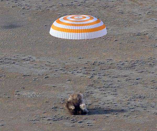 US astronaut and two cosmonauts get down to Earth in a Soyuz capsule