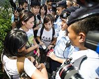 China detains journalist who covered Hong Kong protests: sources