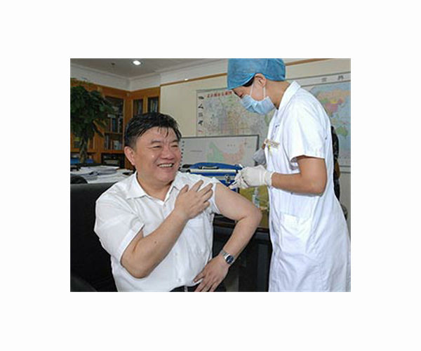 China weighs carrots and sticks in push to vaccinate millions