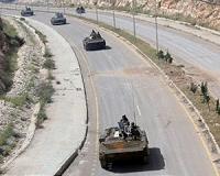 Syria army enters last rebel bastion by Lebanon border