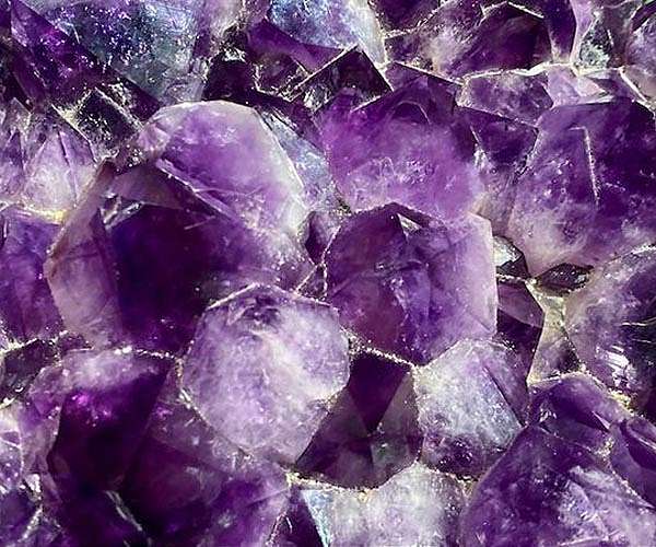 Space-time crystals enable advances in optical materials